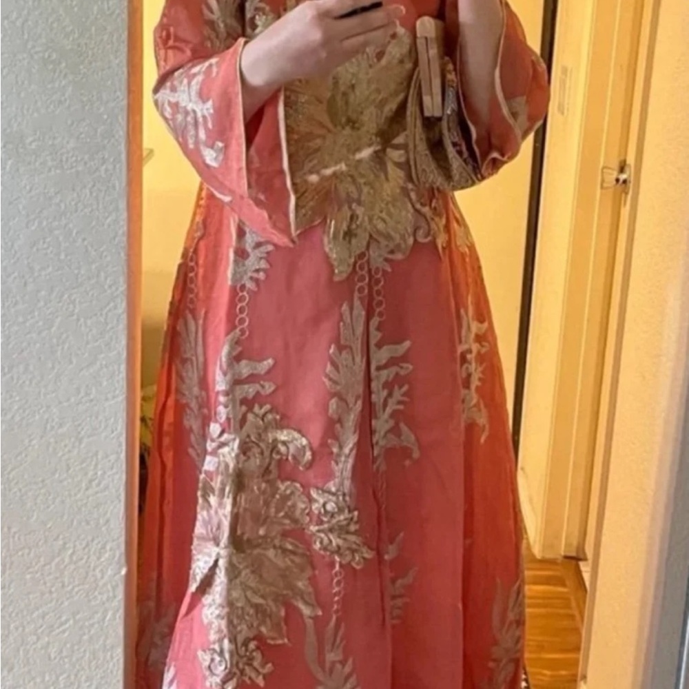 Elegant Coral and Gold Embroidered Gown
